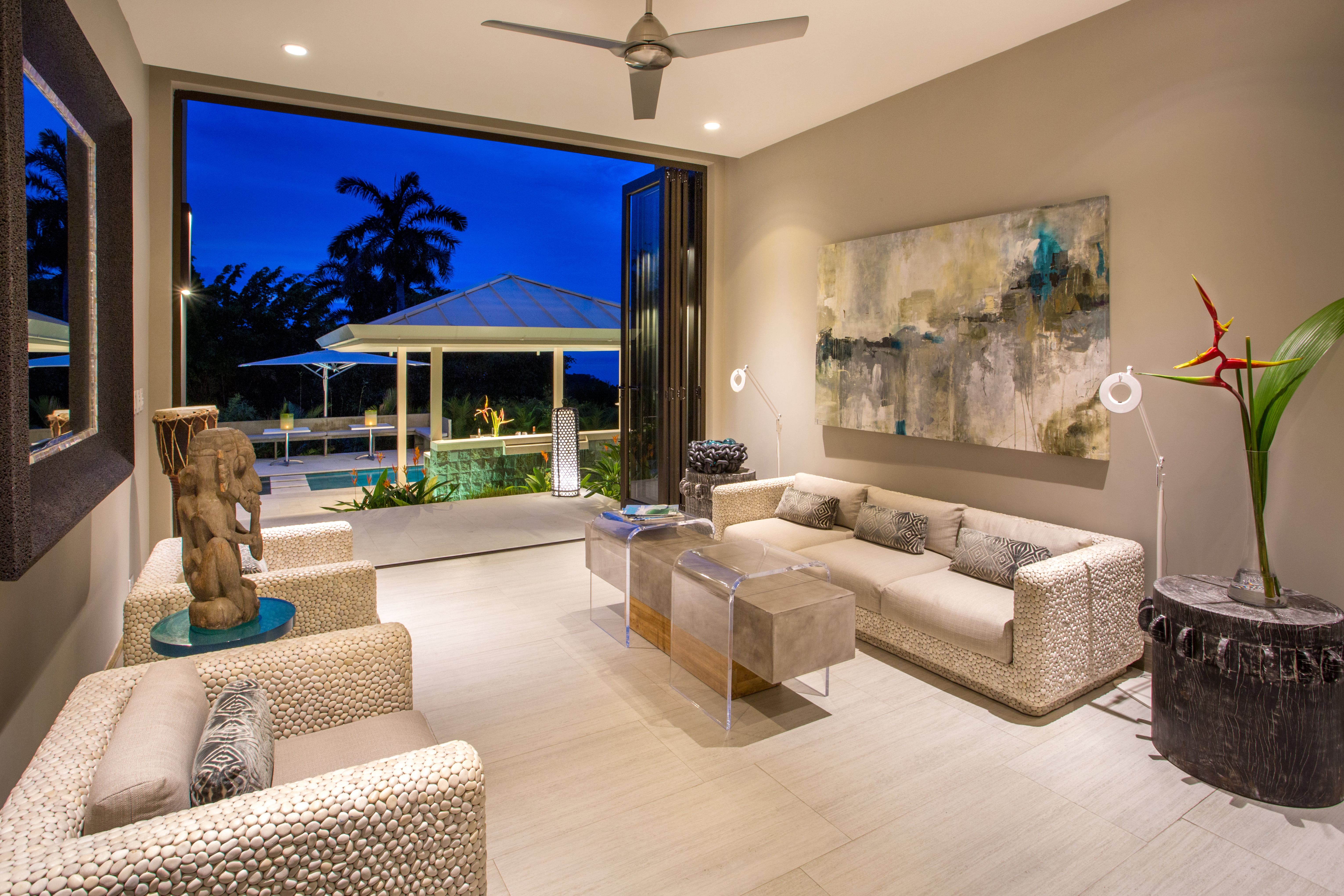 The entry foyer leads to the outdoor entertaining area and pool