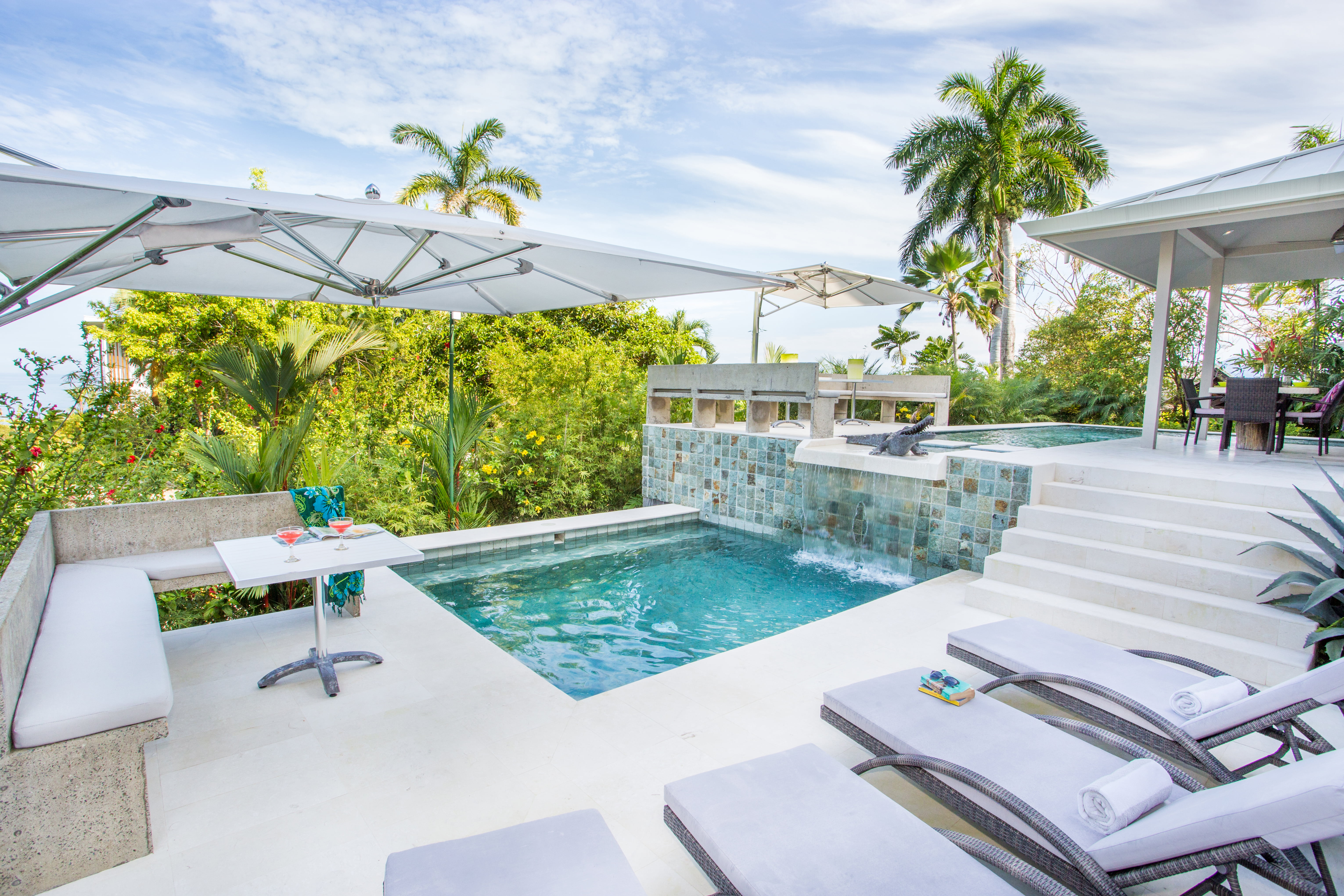 The two level swimming pool and deck areas