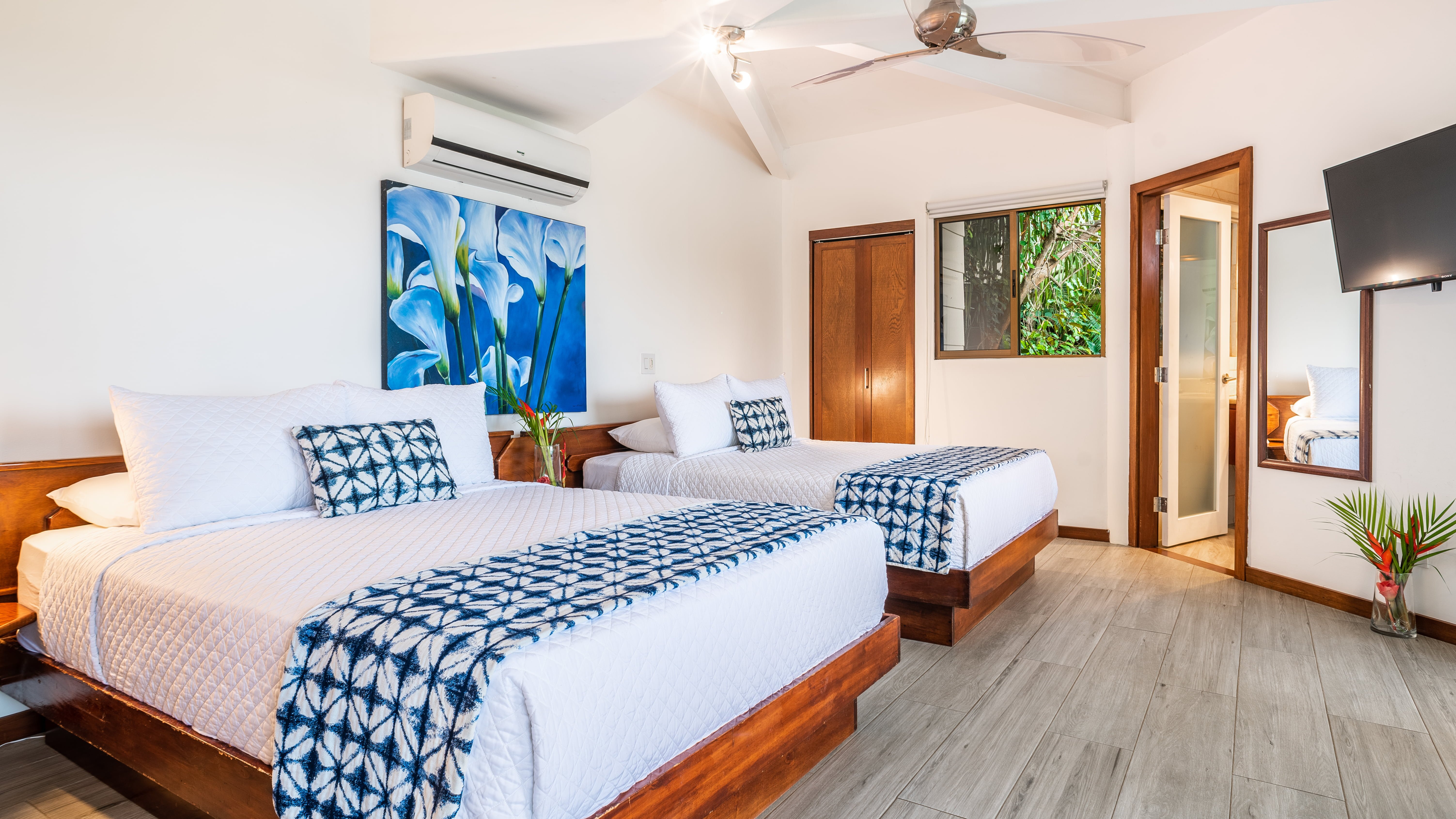 Bedroom with two queen beds and TV