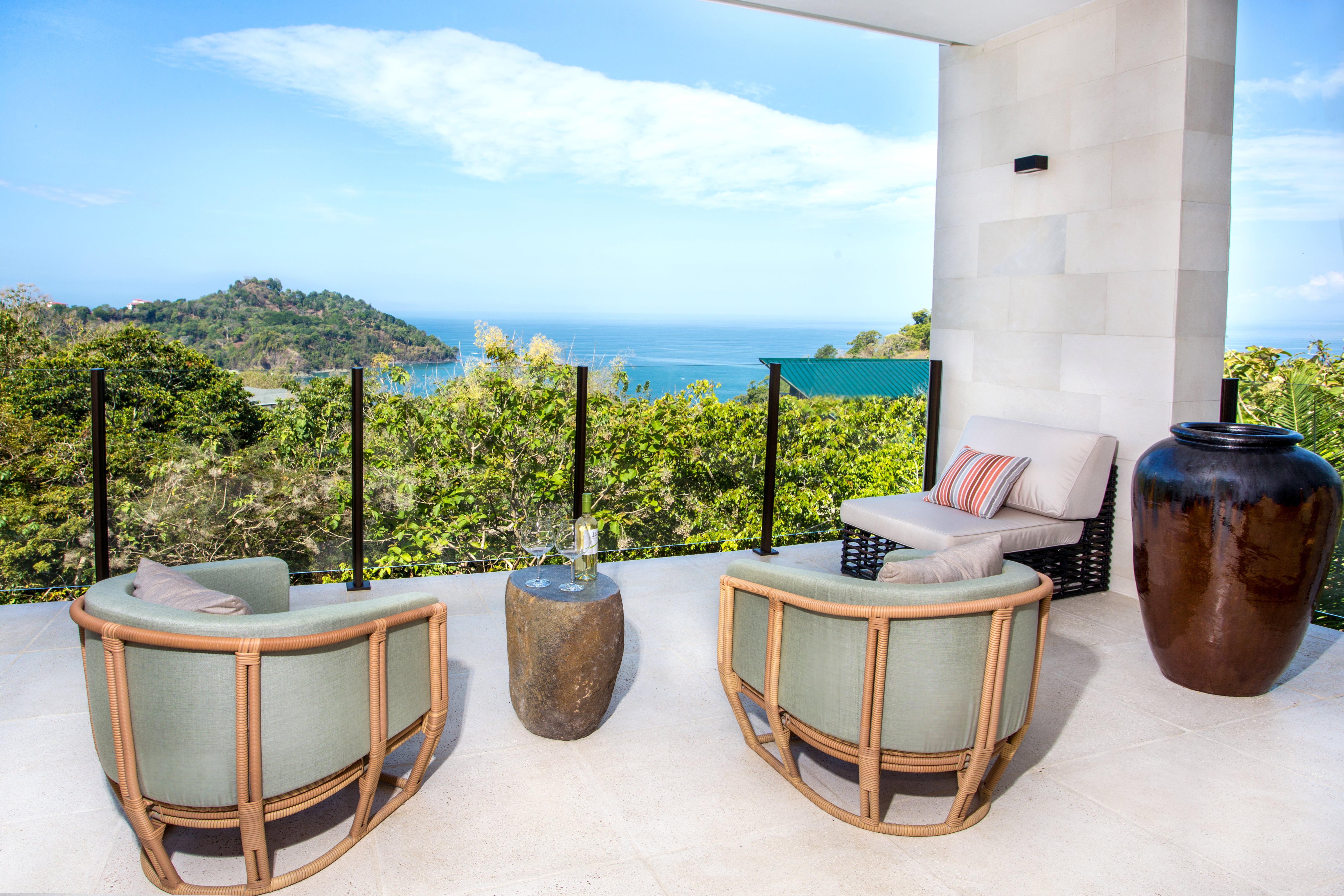 Fourth floor primary bedroom has a large deck with ocean views