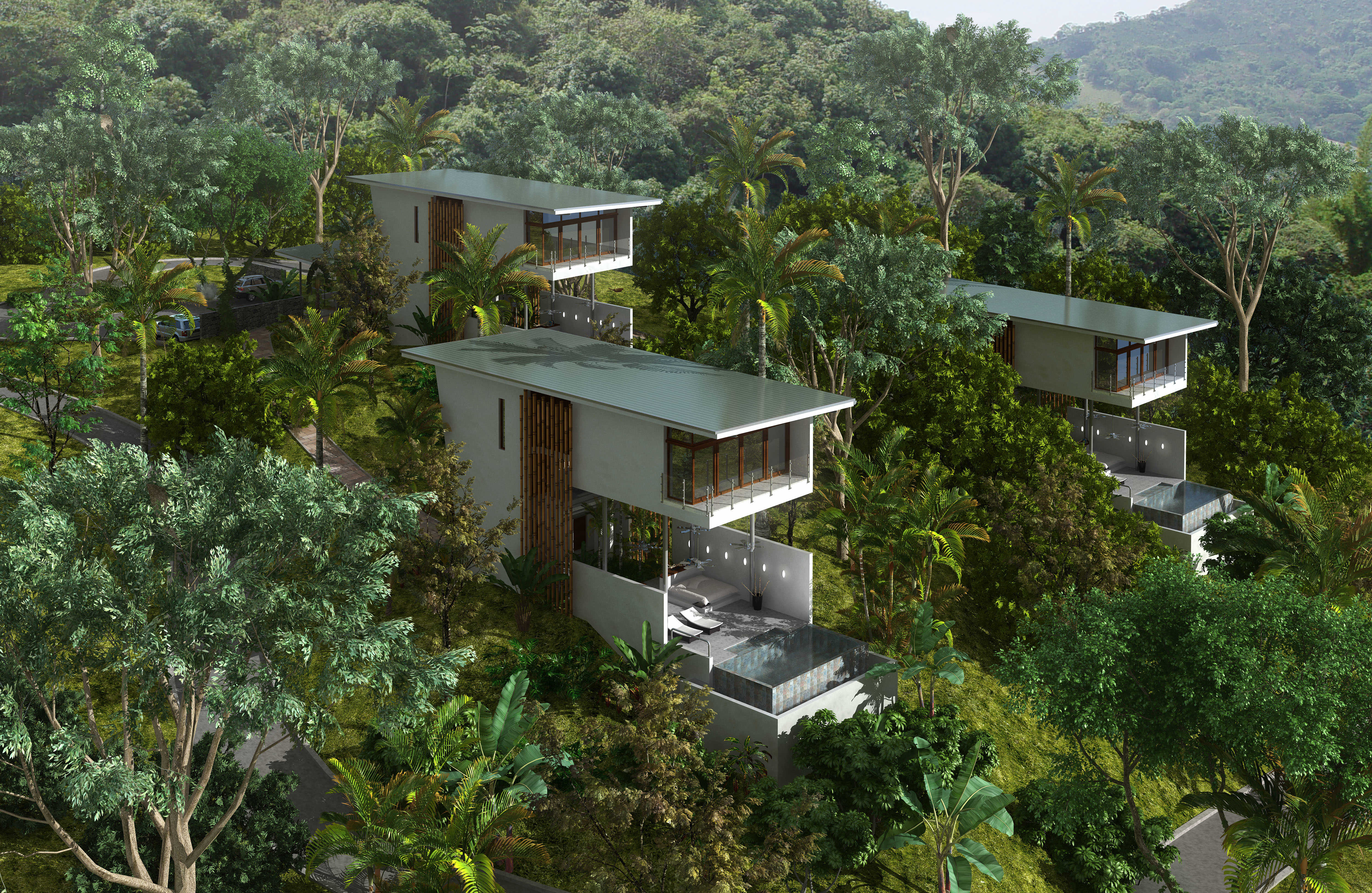 The 3 Bamboo Villas on the hillside overlooking Tulemar and the Pacific