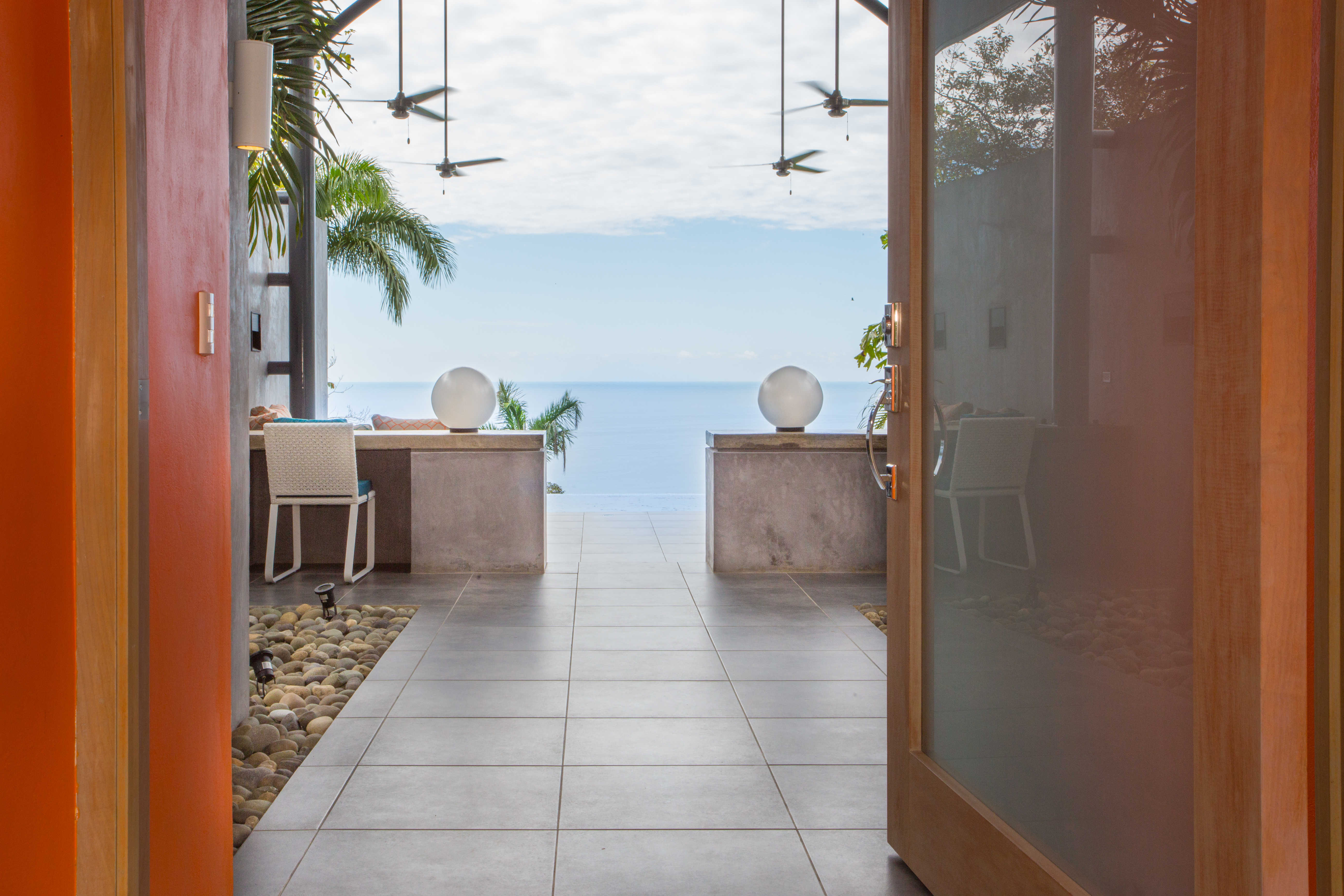 Villa entry, desk area, and views