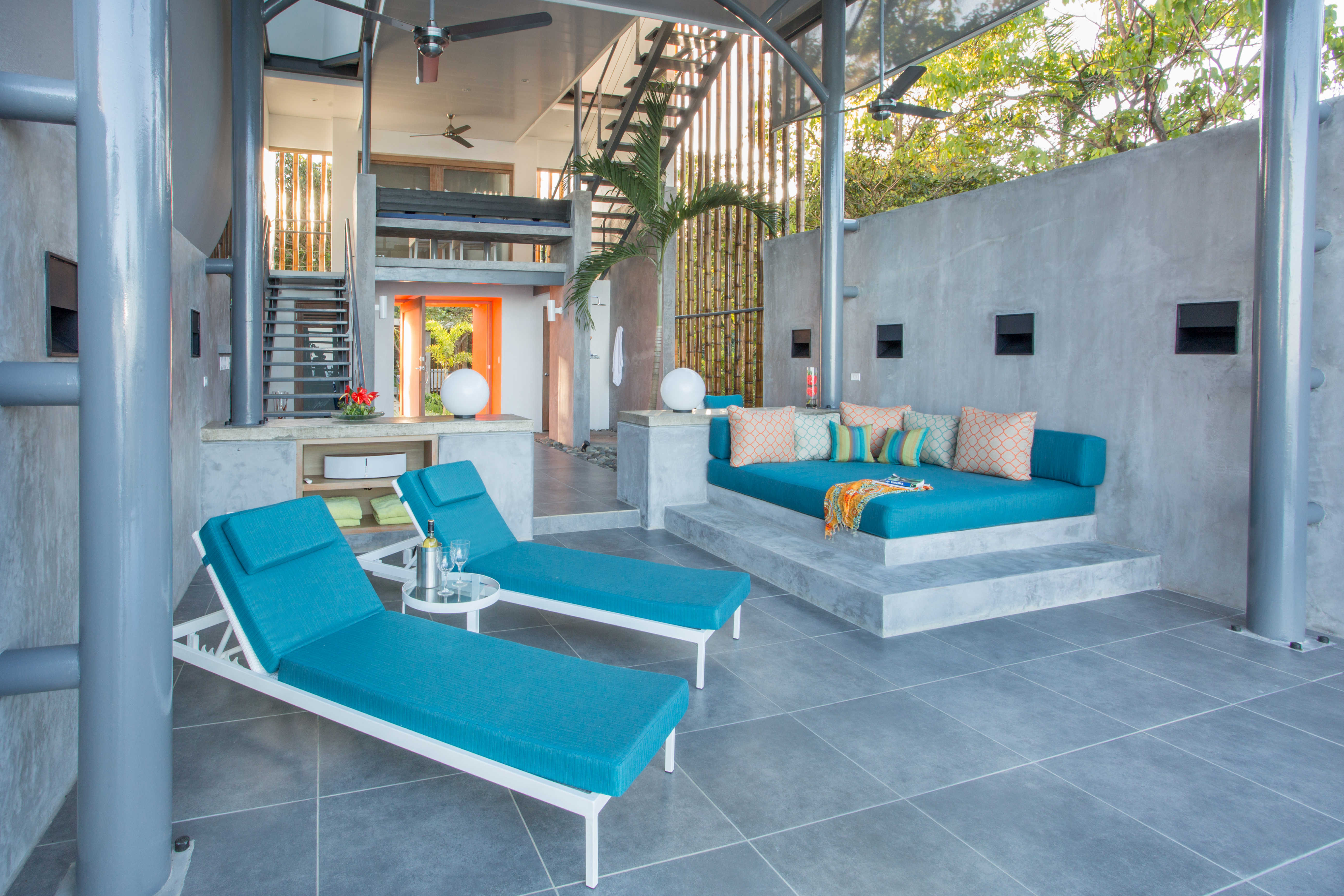 Pool, lounge chairs, and daybed